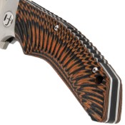 Honshu Sekyuriti Folding Knife: Black/Orange. Precision engineering. Available at Camouflage.ca.